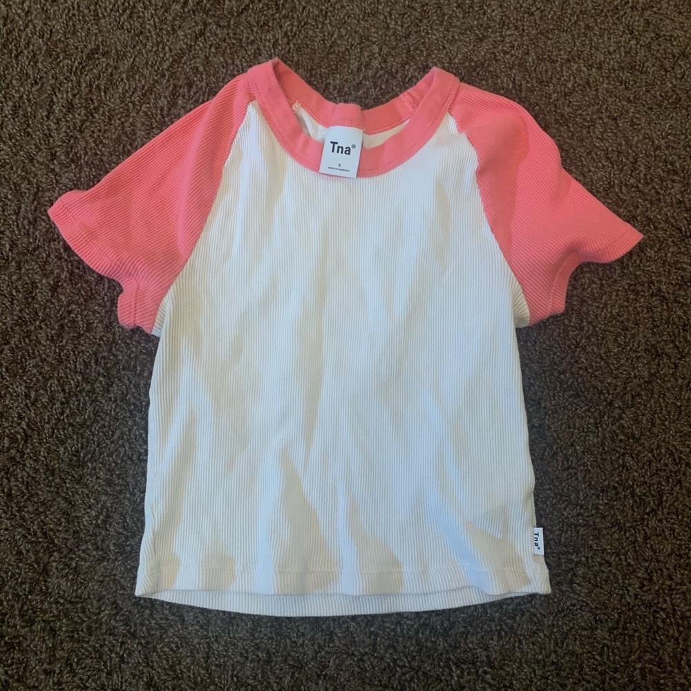 TNA tee